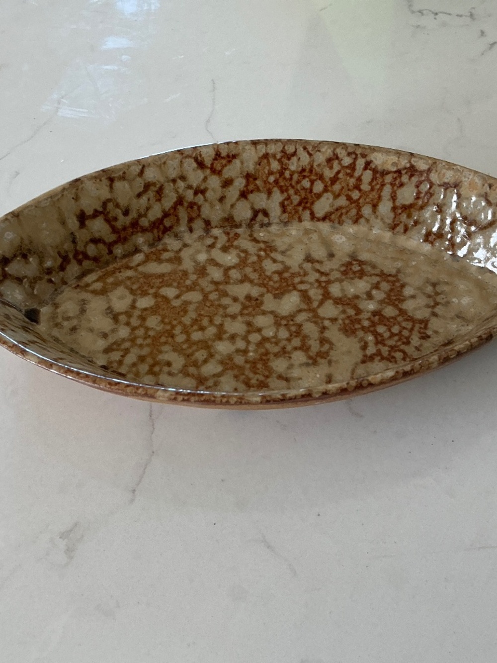 Bloomingwille Pointed Oval Stoneware dish, Glazed interior